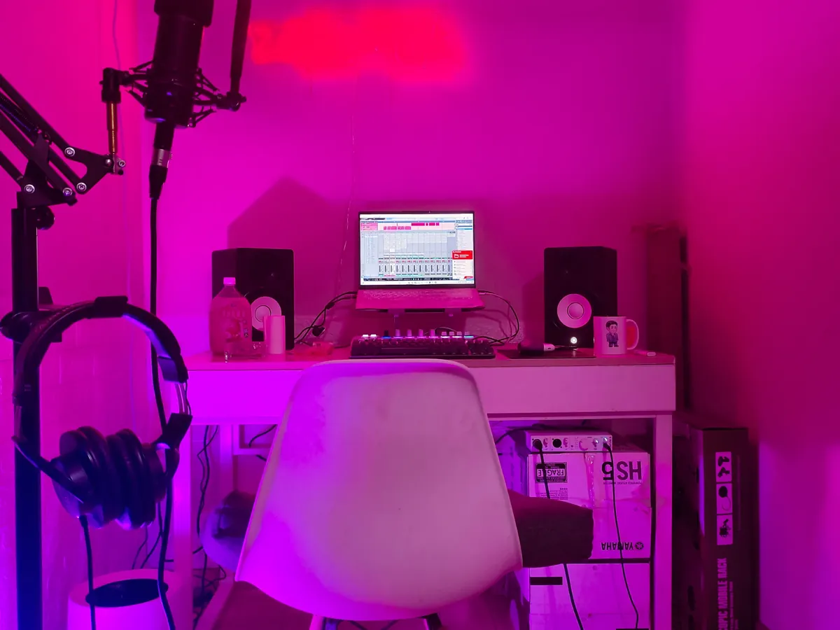 Home music studio lit in magenta
